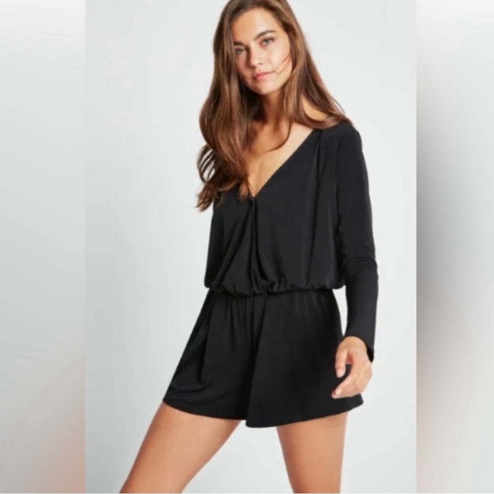 BCBG Generation long sleeved black romper